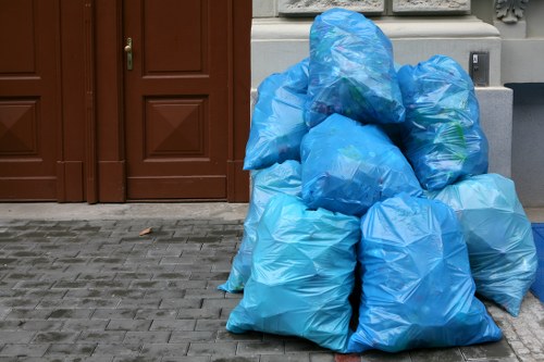 Recycling bins with various builders waste materials in Norwood